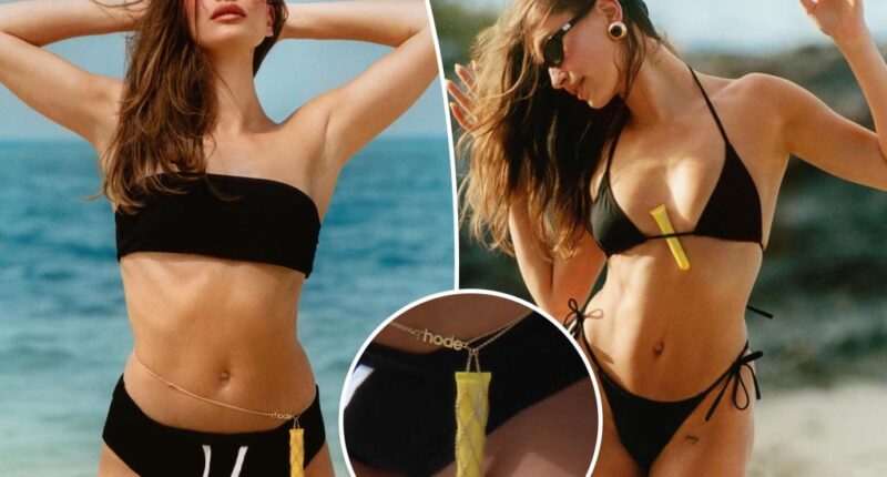 Hailey Bieber styles her bikini with a custom Rhode belly chain