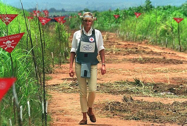 In a flak jacket and face shield, Princess Diana walks along a cleared path on a landmine site in Angola for the Halo Trust in 1997, raising global awareness about the dangers of landmines and contributing to the signing of the Ottawa Treaty banning their use