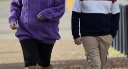Home and Away star Christie Hayes shows off her baby bump during a stroll with her son in Tasmania