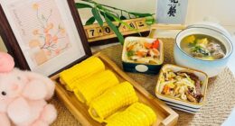 Hundreds of kindergarten pupils have been poisoned after cooks used paint to decorate their meals. Pictured: A photo provided by the kindergarten to parents shows bright yellow corn rolls and stir-fried vegetables