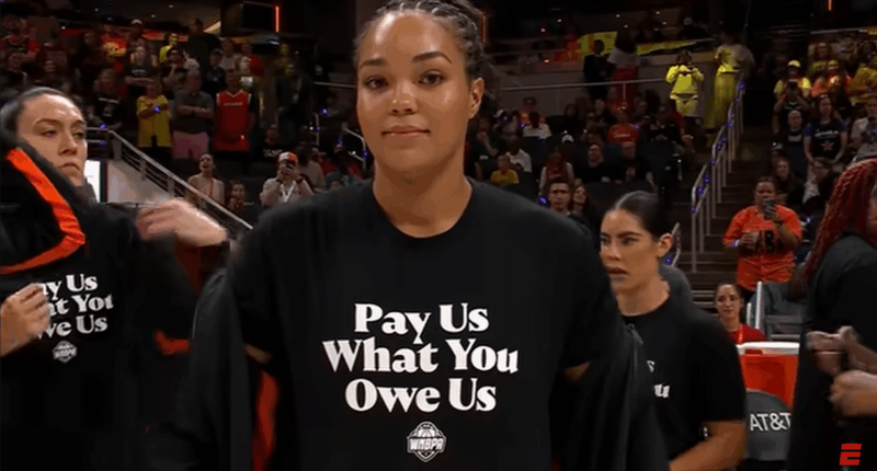 WNBA player wearing a stupid shirt.