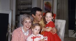 Jamie Lee Curtis (R, pictured in 1958) calls herself the 'OG nepo baby' having had a leg up in showbusiness thanks to her famous parents Janet Leigh and Tony Curtis