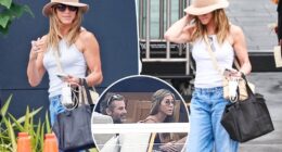 Jennifer Aniston all smiles after Mallorca vacation with Jim Curtis