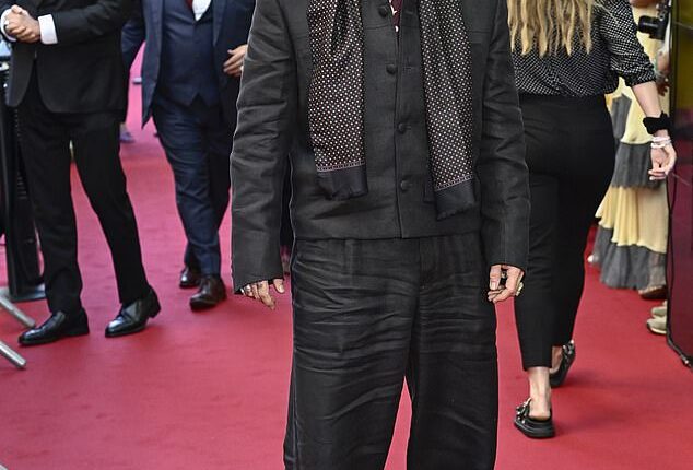 Johnny Depp looked typically stylish as he stepped out for the premiere of his new movie Modi: Three Days on the Wing of Madness on Tuesday