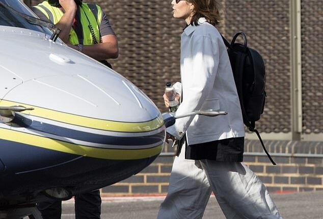 Justin Timberlake, 44, and his wife Jessica Biel, 43, (pictured) cut a casual figure as they took off from London in a helicopter ahead of concert appearance in Great Leighs on Sunday