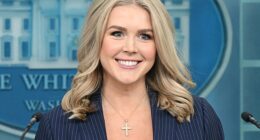 White House Press Secretary Karoline Leavitt appears to have scaled back from wearing her religious cross necklace since she was skewered by Jon Stewart in a brutal late-night joke