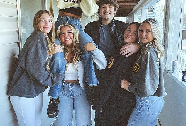 The mom of murdered Idaho student Kaylee Goncalves (second left) revealed her daughter was beaten in the face by killer Brian Kohberger before her death. Goncalves was murdered along with Madison Mogen, 21, (on shoulders)  Xana Kernodle, 20, (second right) and Ethan Chapin, 20