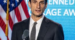 While shopping at an unknown store on Monday, Jack Schlossberg, 32, took a video zooming in on a People magazine cover of Jackie and John F. Kennedy with the headline: 'Jackie Knew Everything.'