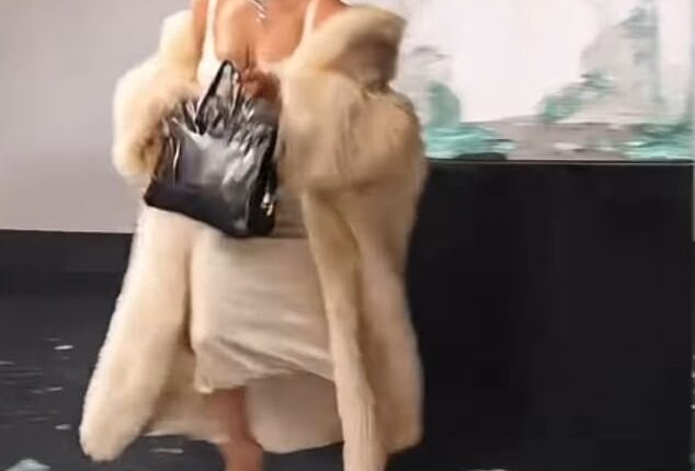 In a move certain to create a fan frenzy, Kim Kardashian has re-posted a fanmade AI video of herself indulging in a spot of burglary