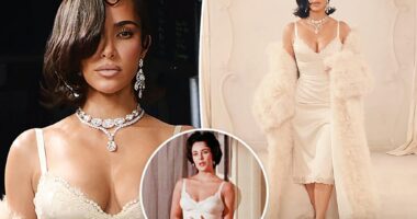 Kim Kardashian wears Elizabeth Taylor's diamond earrings on Balenciaga runway