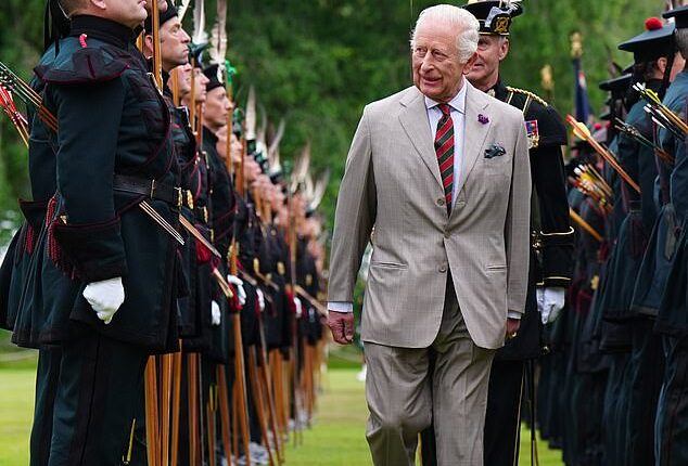The King was greeted with pipes and drums - plus bows and arrows - as he arrived for his traditional official week in Scotland.  Here, he can be seen inspecting a Guard of Honour of soldiers from the Royal Company of Archers, who serve as the King's ceremonial bodyguard in Scotland - a role first created in 1822 for King George VI