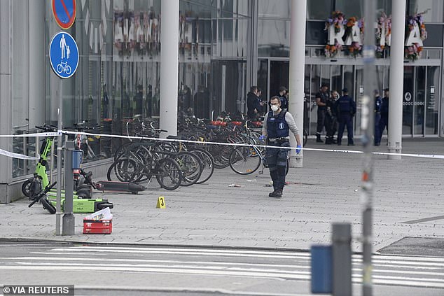 Members of the police stand near a cordoned area outside the Ratina shopping centre, where several people have been stabbed near the shopping centre, in Tampere, Finland July 3, 2025