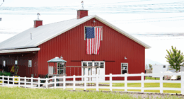 American Flag on Red Barn