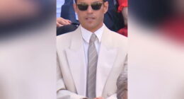 Leonardo DiCaprio laughs with Wimbledon spectators in Royal Box