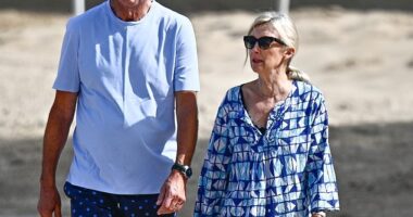 Liverpool legend Alan Hansen, 70, looks fit and healthy as he enjoys sun-soaked stroll with his wife at exclusive Barbados hotel