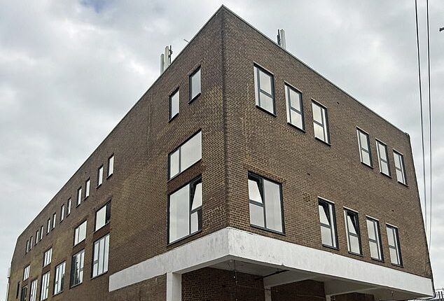 WATERLOOVILLE: A deprived Hampshire town could soon have a migrant hotel, pictured, installed above shops in the middle of the derelict high street