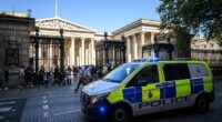 A police van outside the main entrance gates of the British Museum in London in August 2023