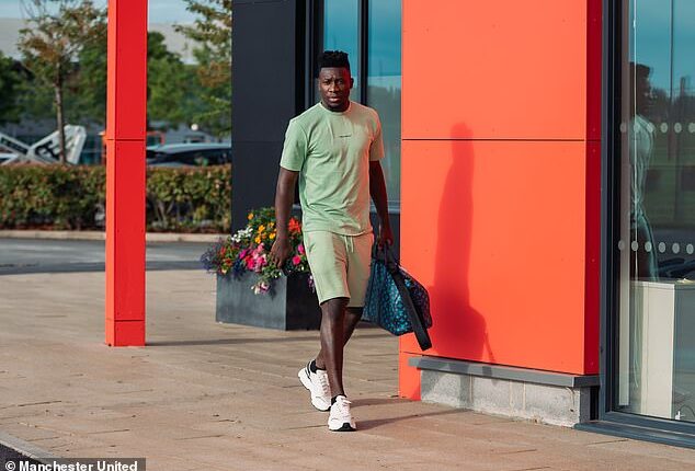 Man United have put a £30million price tag on Andre Onana, pictured at Carrington on Monday