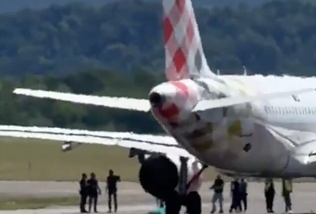 Footage from the runway appears to show people surrounding the aircraft around the time of the accident