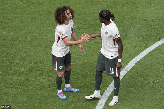 Marc Cucurella (left) branded the timing of Noni Madueke's (right) move 'strange'