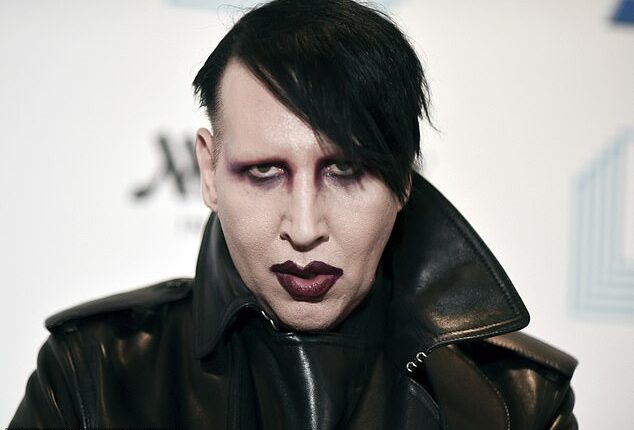 Marilyn Manson (pictured in December 2019) sparked controversy as he appeared at Black Sabbath's farewell concert on Saturday night