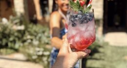 Meghan Markle has shared the recipe for a very patriotic Fourth of July cocktail - as she celebrated the US holiday in a chic blue and white two-piece