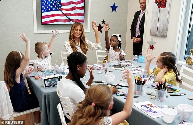 Melania Trump looked effortlessly chic and summery as she made a surprise visit to the patients at the Children's National Hospital in Washington, D.C., on Thursday