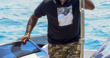 Jordan was seen on the coast of Mykonos walking onto a dock while puffing on a cigar