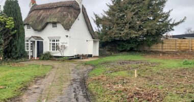 Villagers have been left baffled by the identity of a local homeowner who employed a 'rough' gang of workers to demolish a beloved 300-year-old cottage