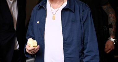 Noel Gallagher looked down in the dumps as he arrived in Manchester for Oasis's homecoming gig at Heaton Park, but Liam was nowhere to be seen