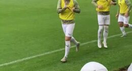 Oldham Athletic striker Kian Harratt waved to supporters during Oldham's pre-season friendly