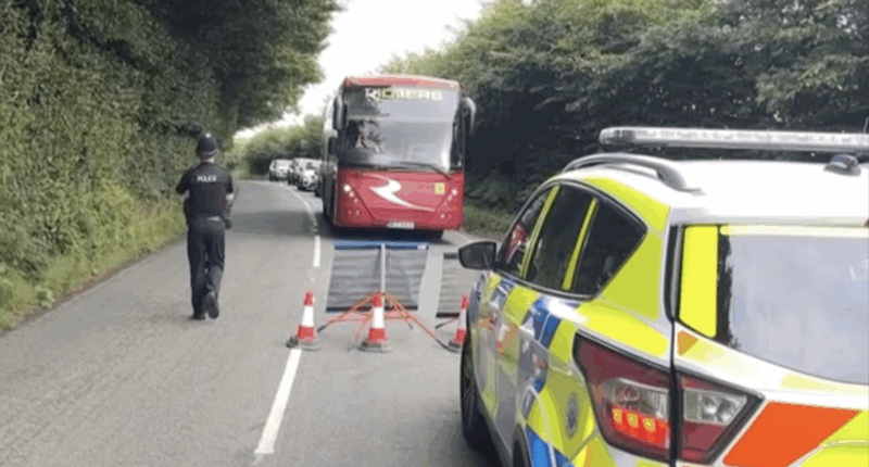One child dead and two seriously injured after school coach overturns in crash