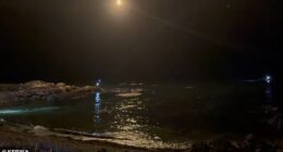 Frantic search efforts are underway after a private plane crash in California has left all three passengers missing (pictured: flares shooting from the airplane over the ocean)