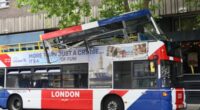 Open-top London tourist bus crashes into tree