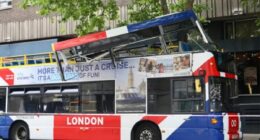 Open-top London tourist bus crashes into tree