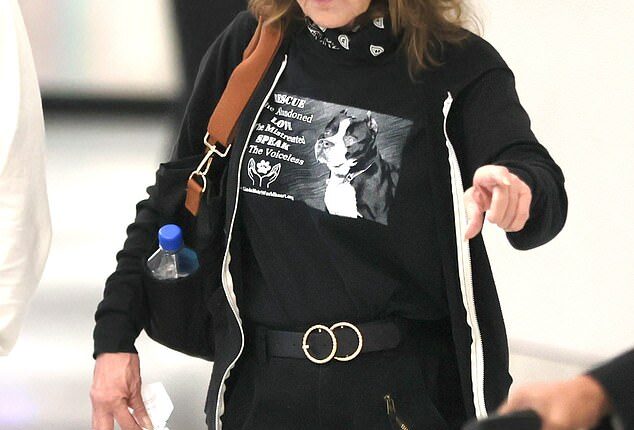 A horror movie icon who shot to fame in a 'cursed' blockbuster which threw her personal life into turmoil was seen on a rare public outing this week - who is she?