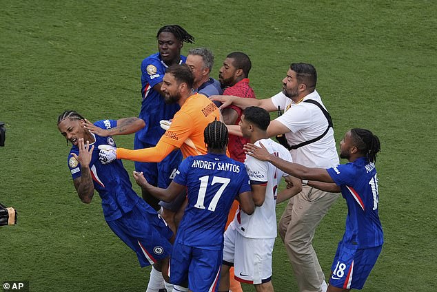 PSG boss Luis Enrique appears to SLAP Chelsea striker Joao Pedro in the face following the Blues' Club World Cup triumph