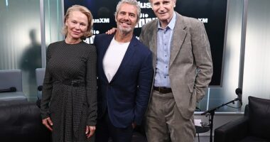 Pamela Anderson (L) and her Naked Gun leading man Liam Neeson (R) brought their undeniable chemistry to SiriusXM Studios in Manhattan on Wednesday where host Andy Cohen (M) shared rare insight into their budding romance