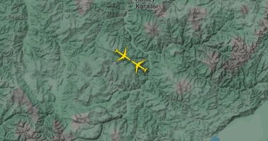 A passenger jet and a cargo plane came within just 300ft of each other after an 'unexpected manoeuvre' by an Air China pilot sent the aircraft directly into the path of an oncoming Boeing 767