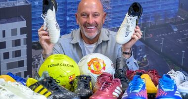 John Horne shows off some of the signed football boots in his collection