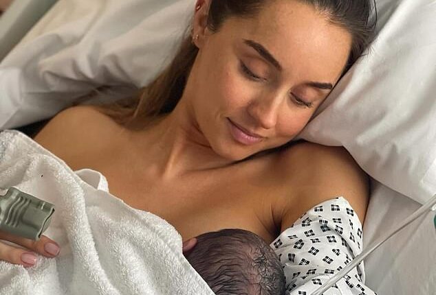 Dr Emily Andre got emotional as she detailed how she had to have emergency surgery after developing a rare and dangerous condition while giving birth to her third child last year (seen)