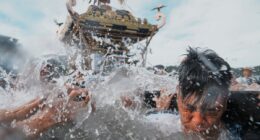 Photos show a town praying for marine safety at a seaside festival near Tokyo