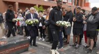 Portuguese-born Everton stars Youssef Chermiti (left) and Beto (right) laid wreaths at Anfield on behalf of the club and paid their respects to Diogo Jota