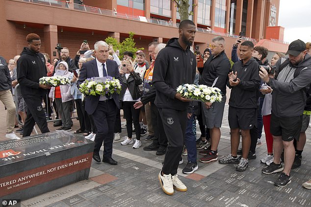 Portuguese-born Everton stars Youssef Chermiti (left) and Beto (right) laid wreaths at Anfield on behalf of the club and paid their respects to Diogo Jota