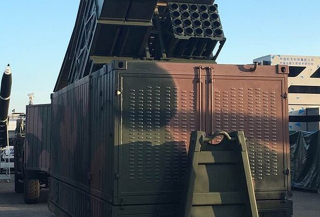 It looks like a regular shipping container unit, but inside, Chinese weapons makers have hidden a missile launcher