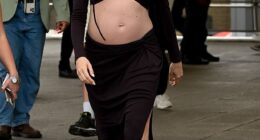 Pixie Lott proudly showcased her baby bump as she arrived at the Excel Centre in London, where she performed at the ABB Formula E FIA World Championships