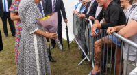 Queen Camilla saw the funny side as she met a royal fan who has had her royal cypher tattooed on his leg