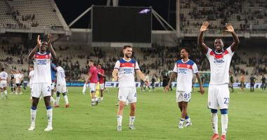 The Rangers players celebrated with the travelling fans after a draining night in Athens