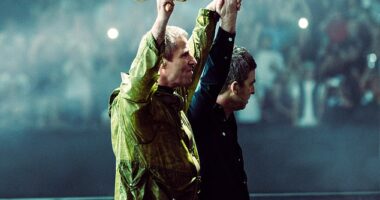 Liam and Noel Gallagher held hands as they walked out on the stage at Cardiff's Principality Stadium for night two of the Oasis tour on Saturday, before revealing the 'real reason' for their long-awaited reunion