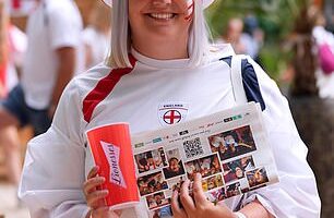 A fan smiles as she awaits the much-anticipated Women's Euro Final in Switzerland